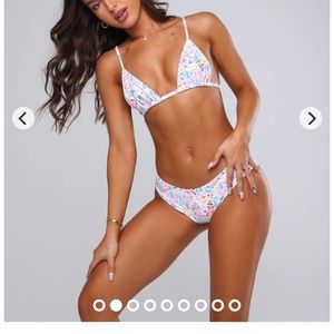 Kulani kini bikini new w/ tags & sanitary sticker. Small top with medium bottoms